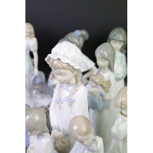 92 - Extensive collection of Spanish Nao figurines to include single figures and groups, as well as swan ... 