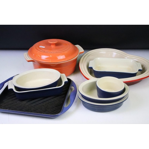 99 - Group of Le Creuset kitchenware, to include cast iron griddle pan, pie dishes, casserole dish & hear... 