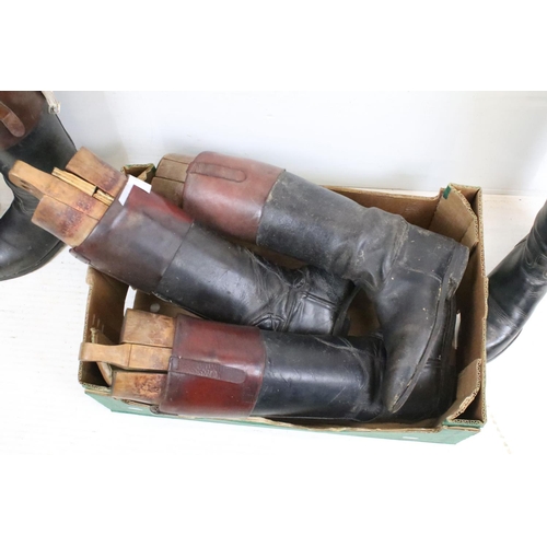 374 - A group of three pairs of vintage leather riding boots complete with wooden trees.