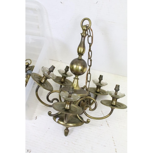 385 - A pair of brass five branch ceiling lights together with two pairs of two branch wall lights.