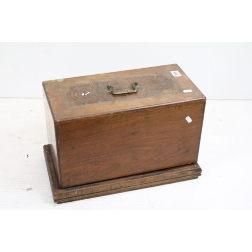 386 - An early 20th century cast iron sewing machine within fitted wooden box together with a vintage type... 