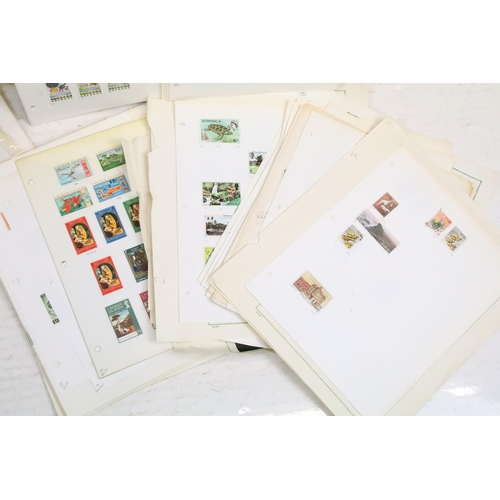 412 - Collection of world stamps mounted to loose stamp album pages, mostly mid 20th Century examples, tog... 