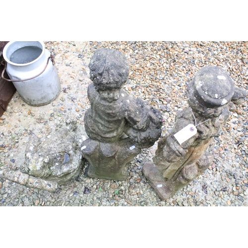 533 - Collection of three reconstituted stone ornamental garden figures, to include a seated gnome, talles... 