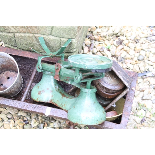 535 - Reconstituted stone planter, together with a feeding trough, cast iron scales (with weights), etc