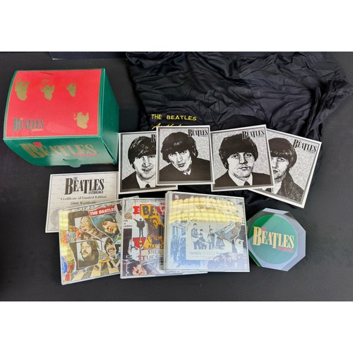 894 - CDs / Music Memorabilia - Collection of various The Beatles related items to include a selection of ... 