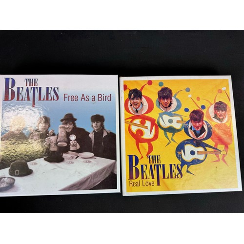 894 - CDs / Music Memorabilia - Collection of various The Beatles related items to include a selection of ... 