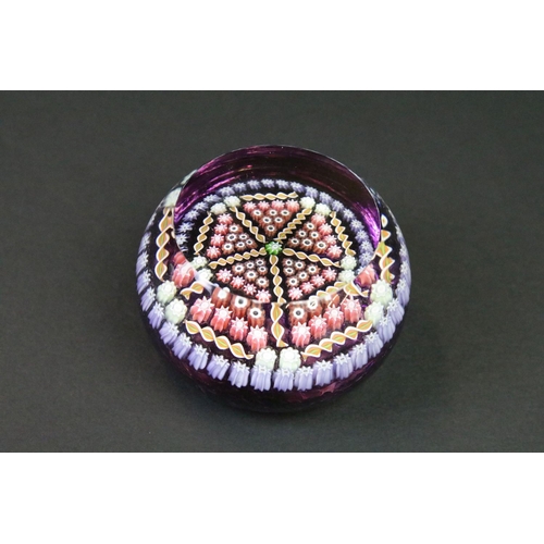 37 - Four Perthshire Glass millefiori paperweights, with central 'P' canes, featuring two boxed examples,... 