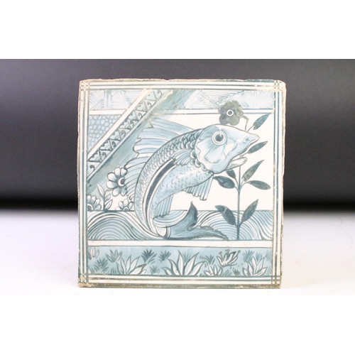 44 - Three ceramic tiles with hand painted designs depicting mushrooms, a stylised fish, and a bird perch... 