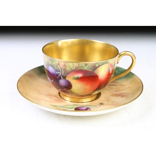 52 - Edward Townsend for Royal Worcester - A 20th Century cabinet cup & saucer with hand painted still li... 