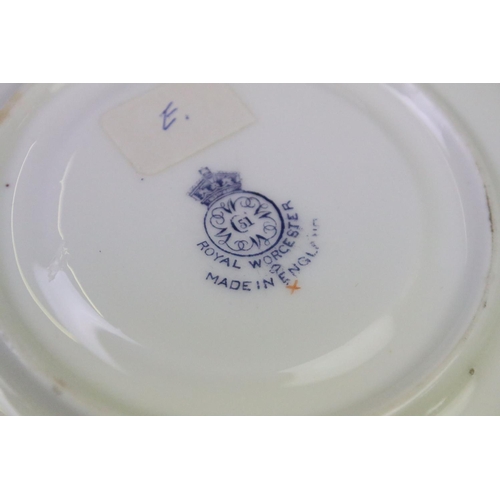 52 - Edward Townsend for Royal Worcester - A 20th Century cabinet cup & saucer with hand painted still li... 