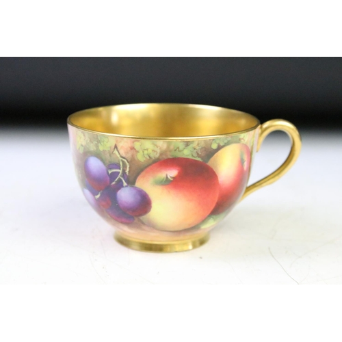 52 - Edward Townsend for Royal Worcester - A 20th Century cabinet cup & saucer with hand painted still li... 