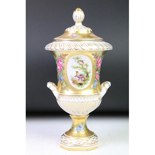 61 - 19th Century gilt porcelain twin-handled urn & cover, decorated with hand painted ornithological pan... 