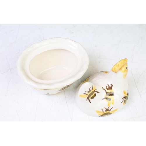 67 - A Emma Bridgewater Bumble Bee pattern hen on nest egg coddler (First), stands approx 10cm in height ... 