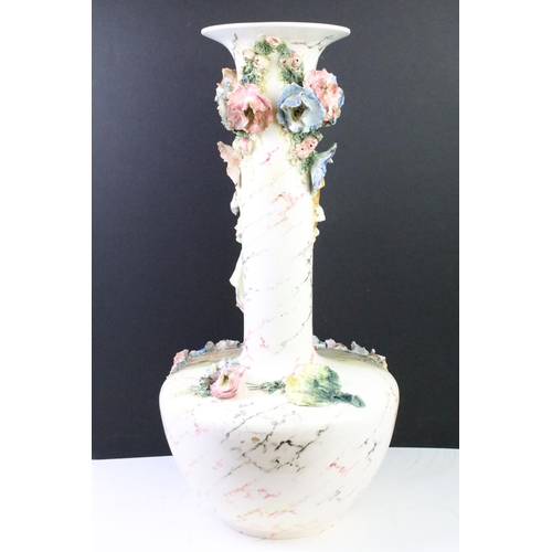 84 - 20th Century large ceramic centre piece vase having an applied figure of a woman with floral encrust... 