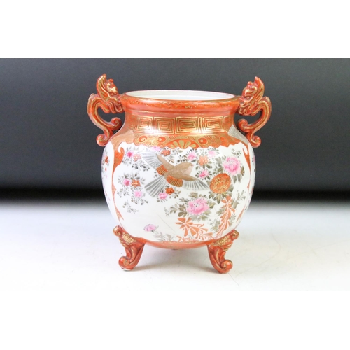 85 - Pair of Japanese Kutani vases being hand decorated with perched birds, together with a matching twin... 