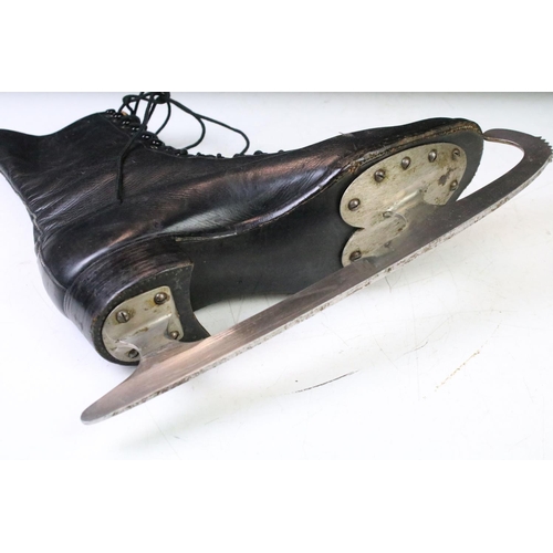 90 - Pair of Stille Swedish black leather lace up ice skates complete with fitted blade sheaths. Measures... 