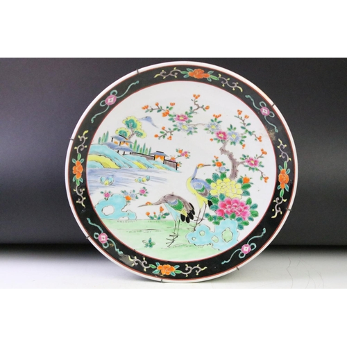 107 - 19th Century Chinese blue and white hand painted plate decorated with mythical lion to centre (four ... 