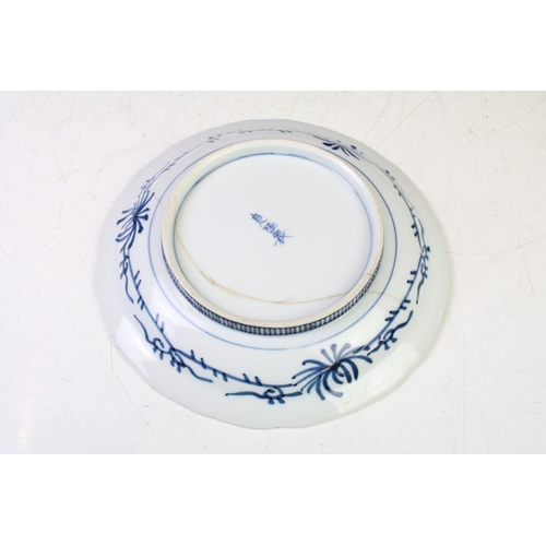 107 - 19th Century Chinese blue and white hand painted plate decorated with mythical lion to centre (four ... 