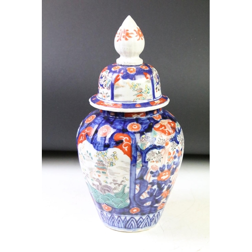 108 - Japanese Imari lidded vase being hand painted with landscape scenes in panels together with a Japane... 