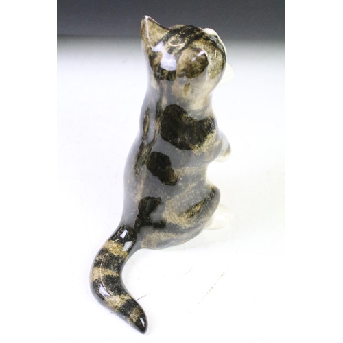 110 - Five Winstanley ceramic studio pottery cats each with yellow glass eyes, together with an Italian ce... 