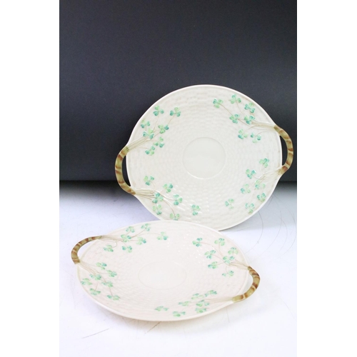 112 - Collection of late 20th Century and 21st Century Belleek to include two twin handled plates, five va... 