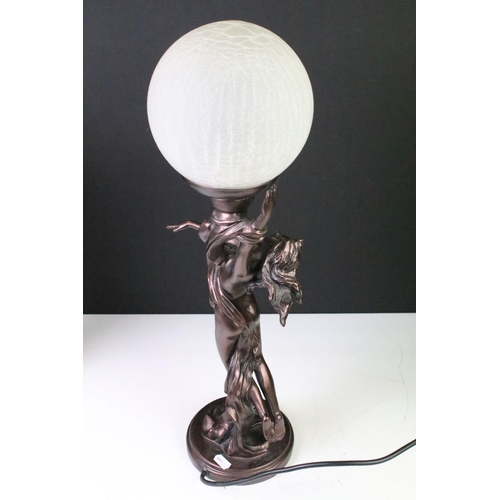 405 - Three Art Deco style table lamps to include two bronzed base examples with female figures, and one w... 