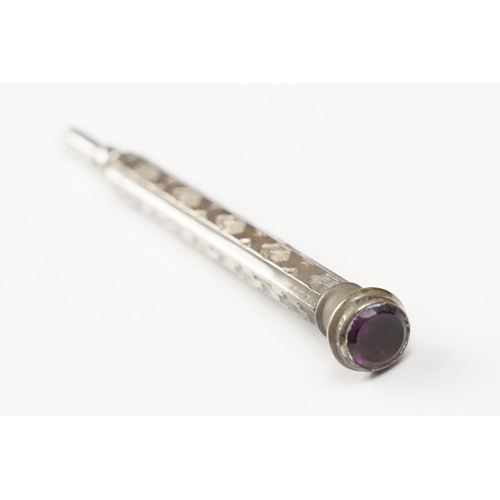 201 - Wembley 1925 Silver Plated Propelling Pencil with purple stone finial, 10cm