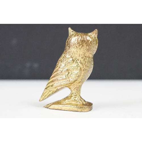 204A - Brass Model of a Brass Owl with blue glass eyes, 6cm high