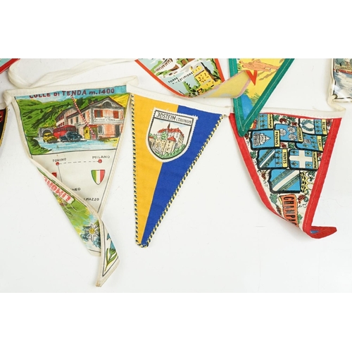 205 - A collection of mid 20th century souvenir pennants together with two coin trench lighters and two vi... 