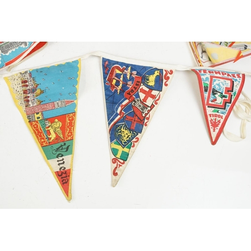 205 - A collection of mid 20th century souvenir pennants together with two coin trench lighters and two vi... 