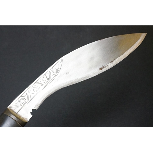 209 - Nepalese Kukri Knife in leather scabbard