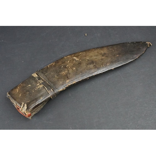 209 - Nepalese Kukri Knife in leather scabbard