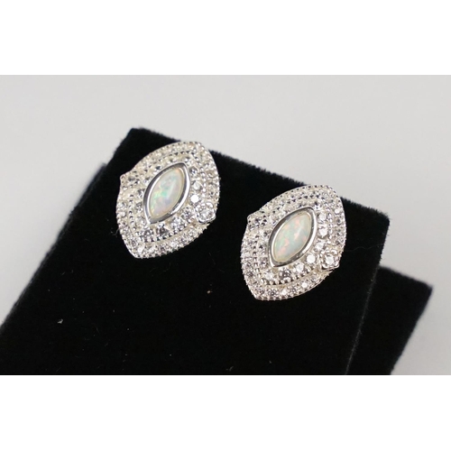 213 - Pair of Silver and Opal Stud Earrings