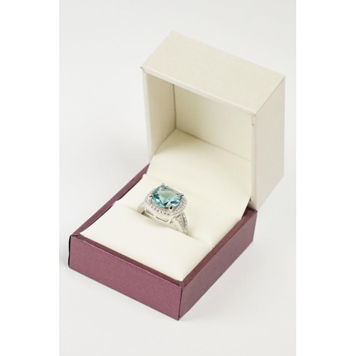 217 - Silver CZ and Blue Topaz style Ring