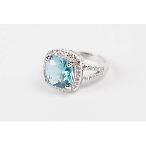 217 - Silver CZ and Blue Topaz style Ring