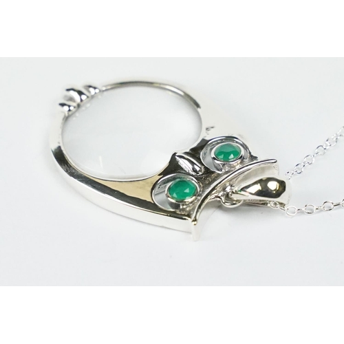 232 - Silver Magnifying Pendant Necklace in the form of an Owl with Emerald Eyes