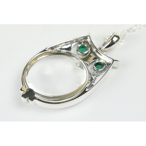 232 - Silver Magnifying Pendant Necklace in the form of an Owl with Emerald Eyes