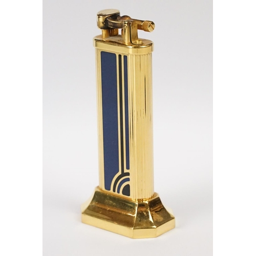 250 - A Dunhill table lighter on octagonal weighted base, numbered 26264 to base, blue and black Art Deco ... 