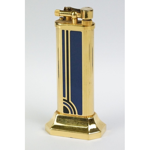 250 - A Dunhill table lighter on octagonal weighted base, numbered 26264 to base, blue and black Art Deco ... 