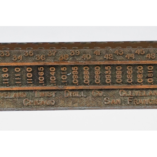 253 - The Cleveland Drill Co. metal sales display stand for drill bits, measures approx 21cm in length.