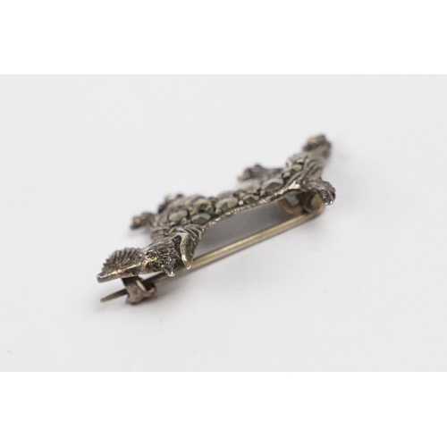 271 - A vintage sterling silver and marcasite brooch in the form of a scottie dog together with a contempo... 