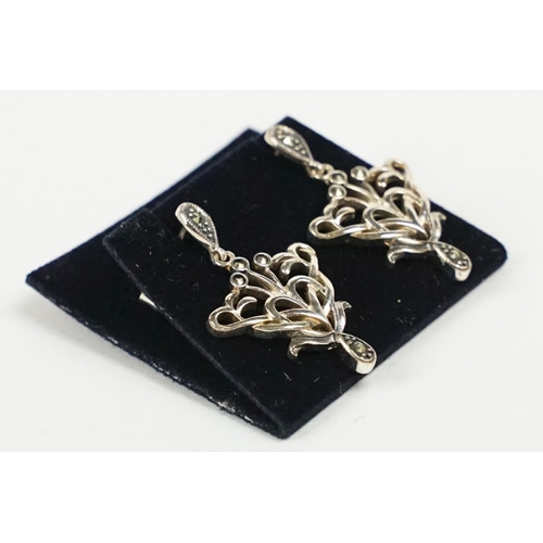 275 - A pair of 925 sterling silver Art Nouveau pattern drop earrings with marcasite, marked 925 for sterl... 