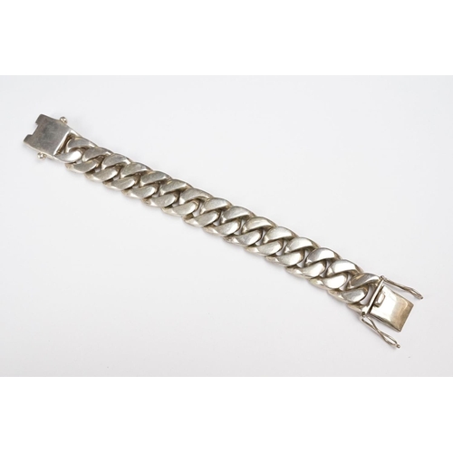 276 - A 925 sterling silver large heavyweight solid link curb bracelet, overall length 22.5cm, link width ... 