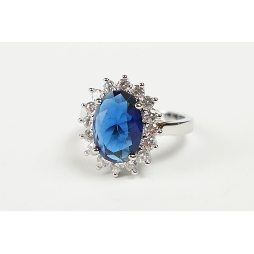 280 - A 925 sterling silver ladies dress ring of classical style with oval blue centre stone, marked 925 f... 