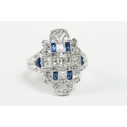 281 - A 925 sterling silver ladies dress ring in the Art Deco style set with blue and clear stones, marked... 