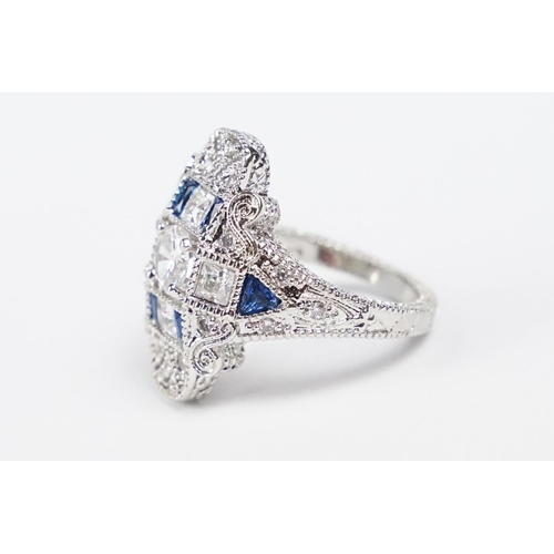 281 - A 925 sterling silver ladies dress ring in the Art Deco style set with blue and clear stones, marked... 