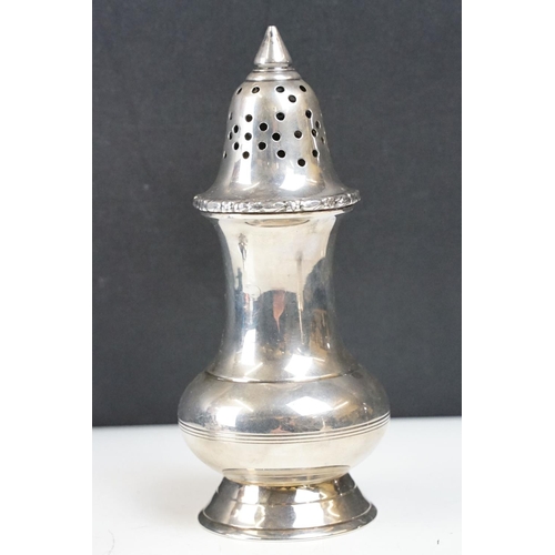 285 - A fully hallmarked sterling silver sugar shakers together with a silver plated examples and a hallma... 