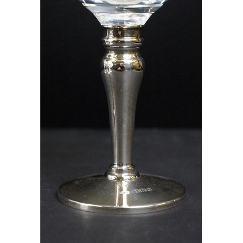 286 - A set of six fully hallmarked sterling silver and cut glass goblets by Mappin & Webb.