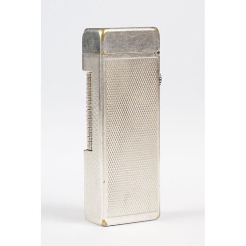 290 - A mid 20th century silver plated Dunhill pocket lighter with service reciept.