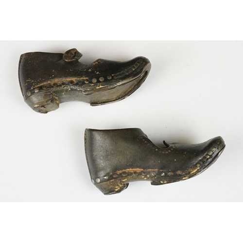 314 - A pair of antique childrens leather shoes.